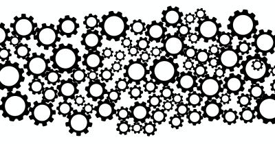 black and white illustration of gears working together